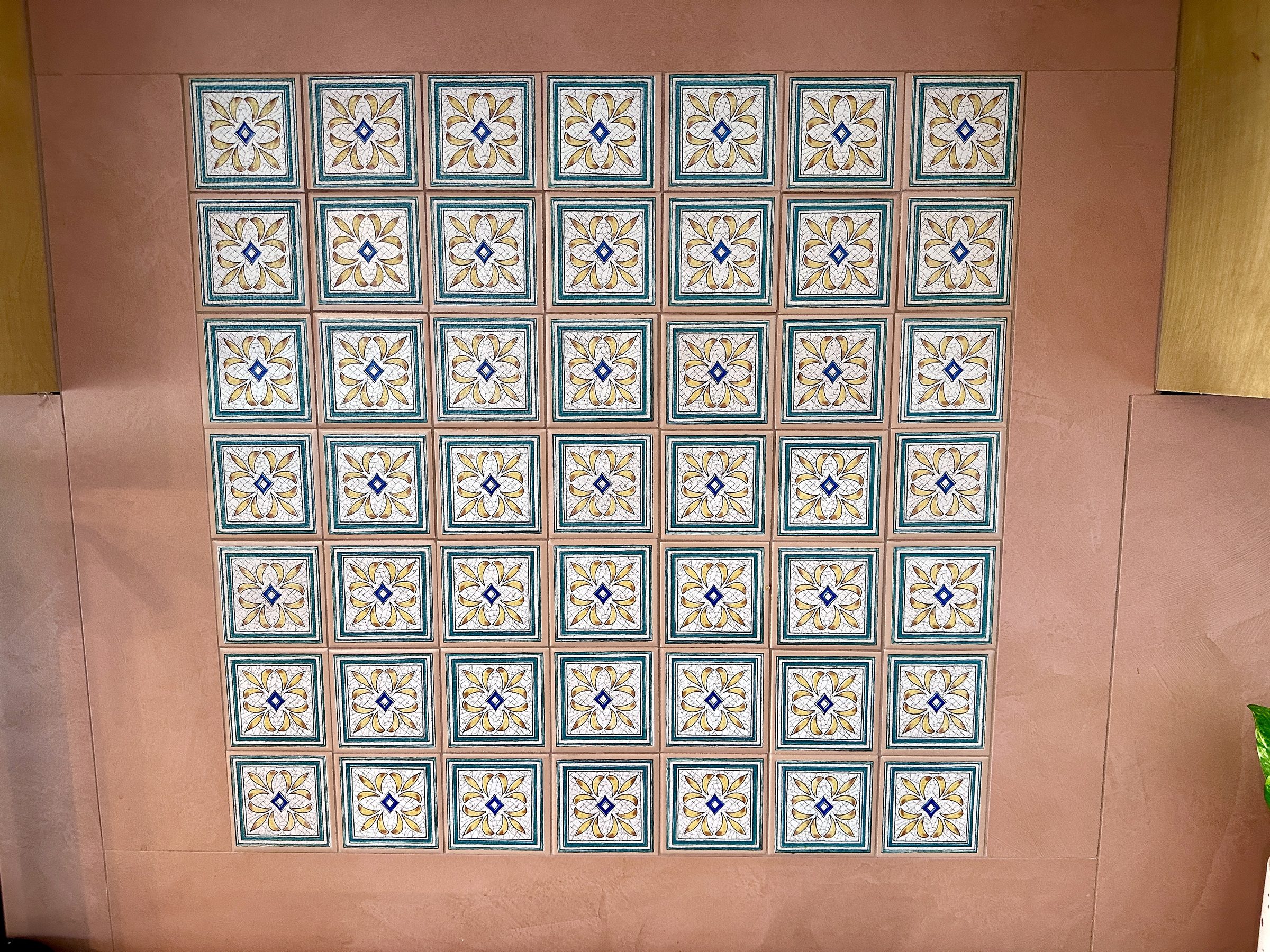 Hand-painted Spanish tile inset in Dekton backsplash
