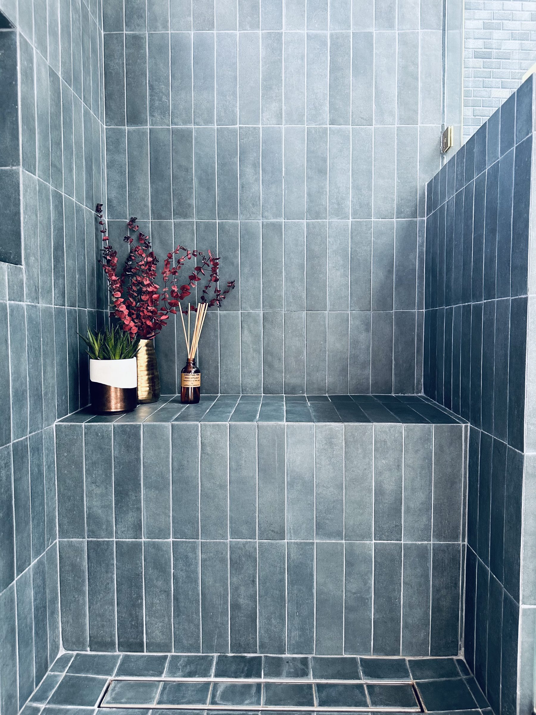 Teal matte tile shower